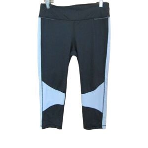 Alala Gym leggings Size Large black & silver mesh panel with back zip pocket